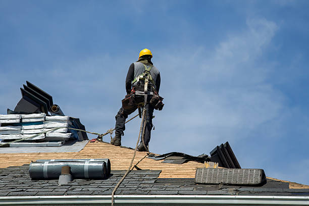 Professional Gutter Installation technician working in Babson Park, MA